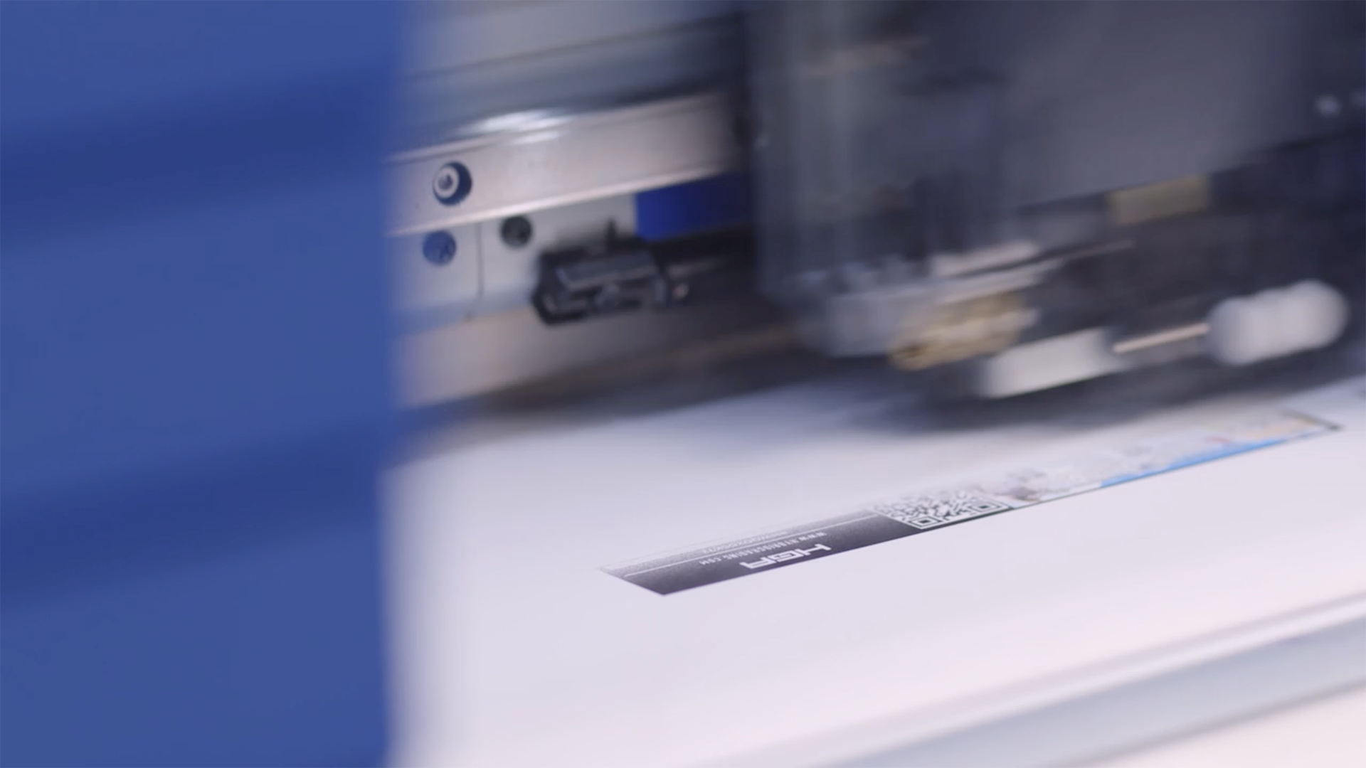 Close-up of a grading label being applied to a sports trading card